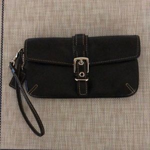 Coach Wristlet in black.